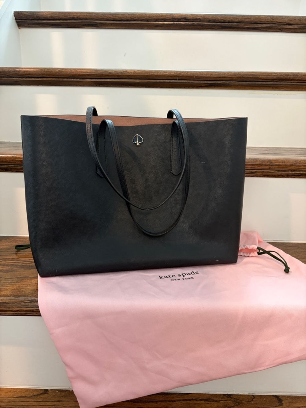 kate spade black leather tote with brown interior trim